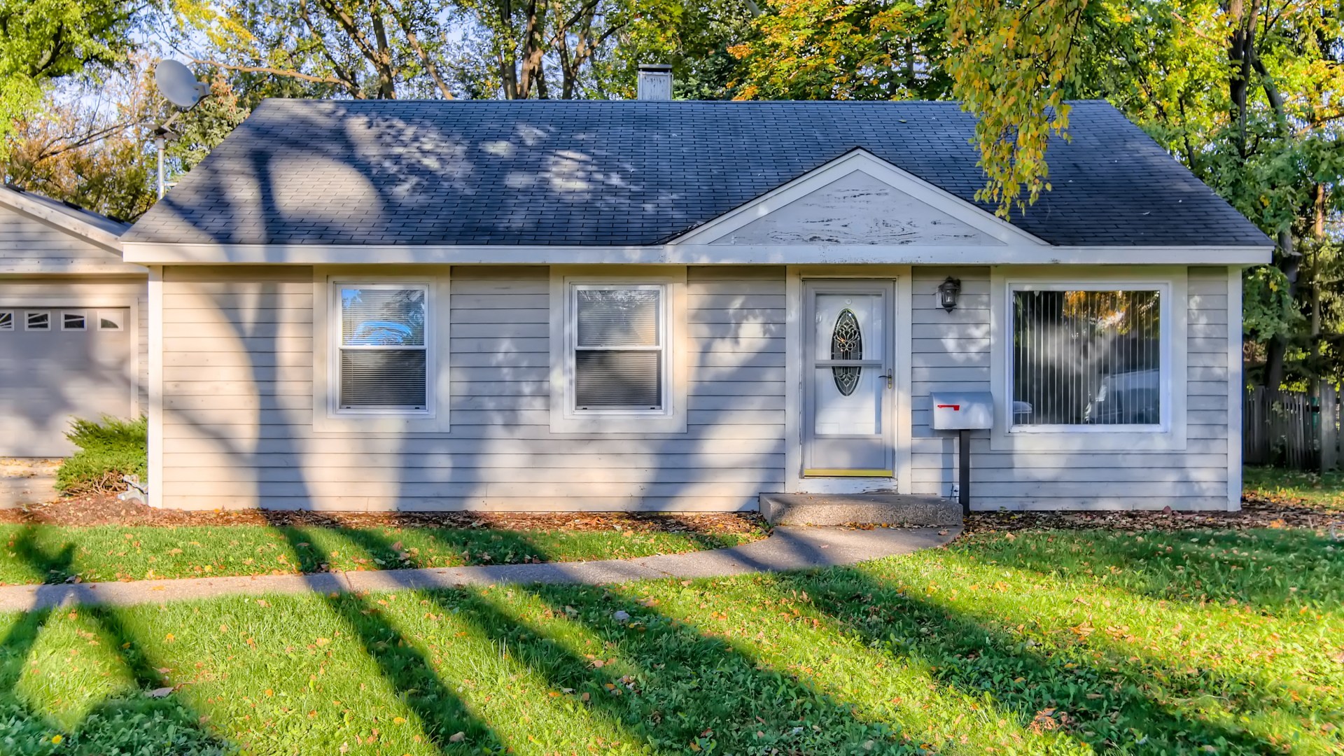171 Raupp Boulevard Buffalo Grove, IL 60089 - Photo 3 of 23 a front view of house with yard