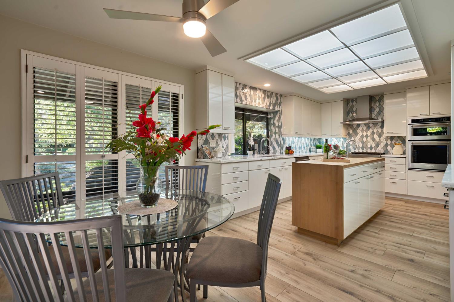 7529 Pineridge Road Fair Oaks, CA 95628 - Photo 15 of 62 a dining room with furniture window and wooden floor