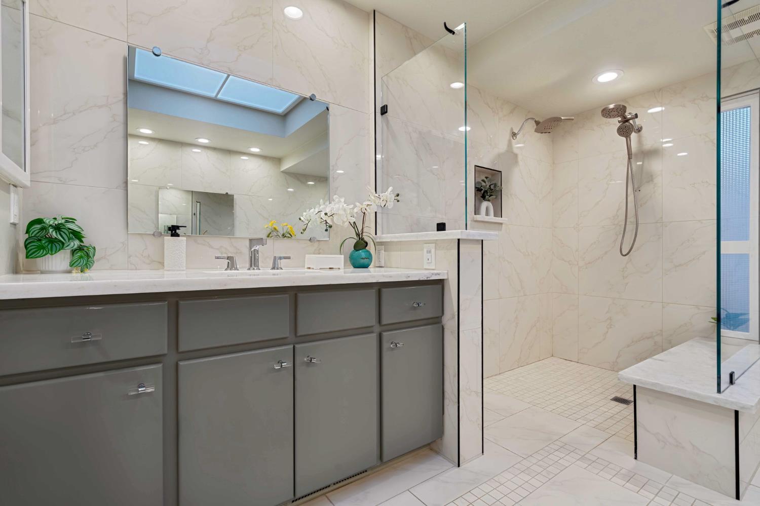 7529 Pineridge Road Fair Oaks, CA 95628 - Photo 19 of 62 a bathroom with a double vanity sink mirror and shower