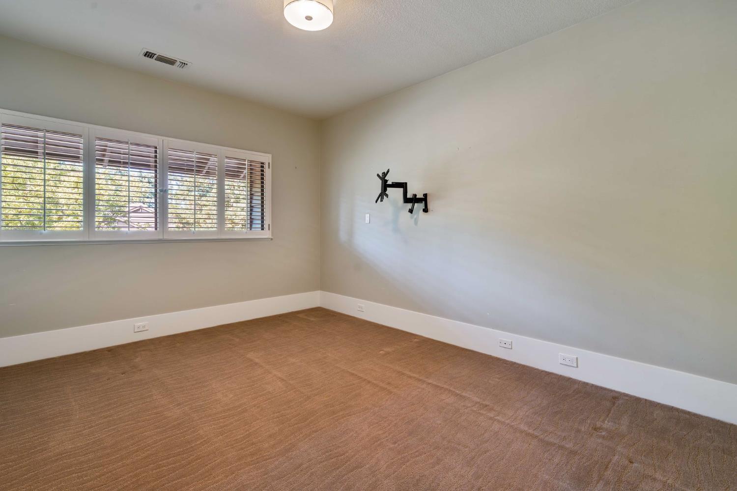 7529 Pineridge Road Fair Oaks, CA 95628 - Photo 29 of 62 wooden floor in an empty room with a window
