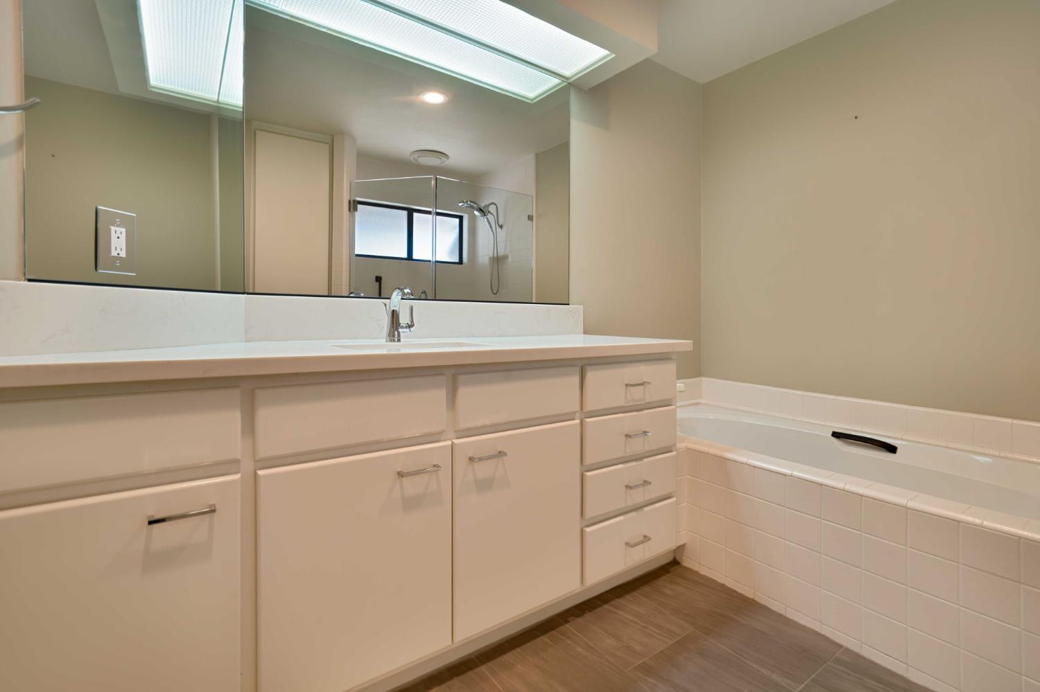 7529 Pineridge Road Fair Oaks, CA 95628 - Photo 32 of 62 a bathroom with a sink and mirror