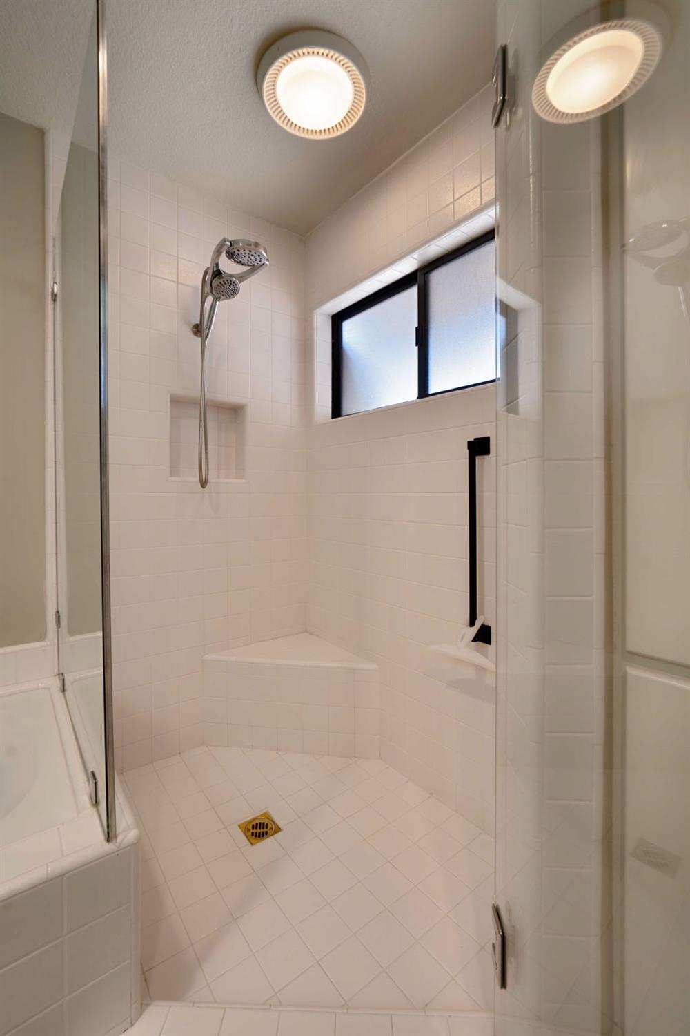 7529 Pineridge Road Fair Oaks, CA 95628 - Photo 33 of 62 a bathroom with a tub and a shower