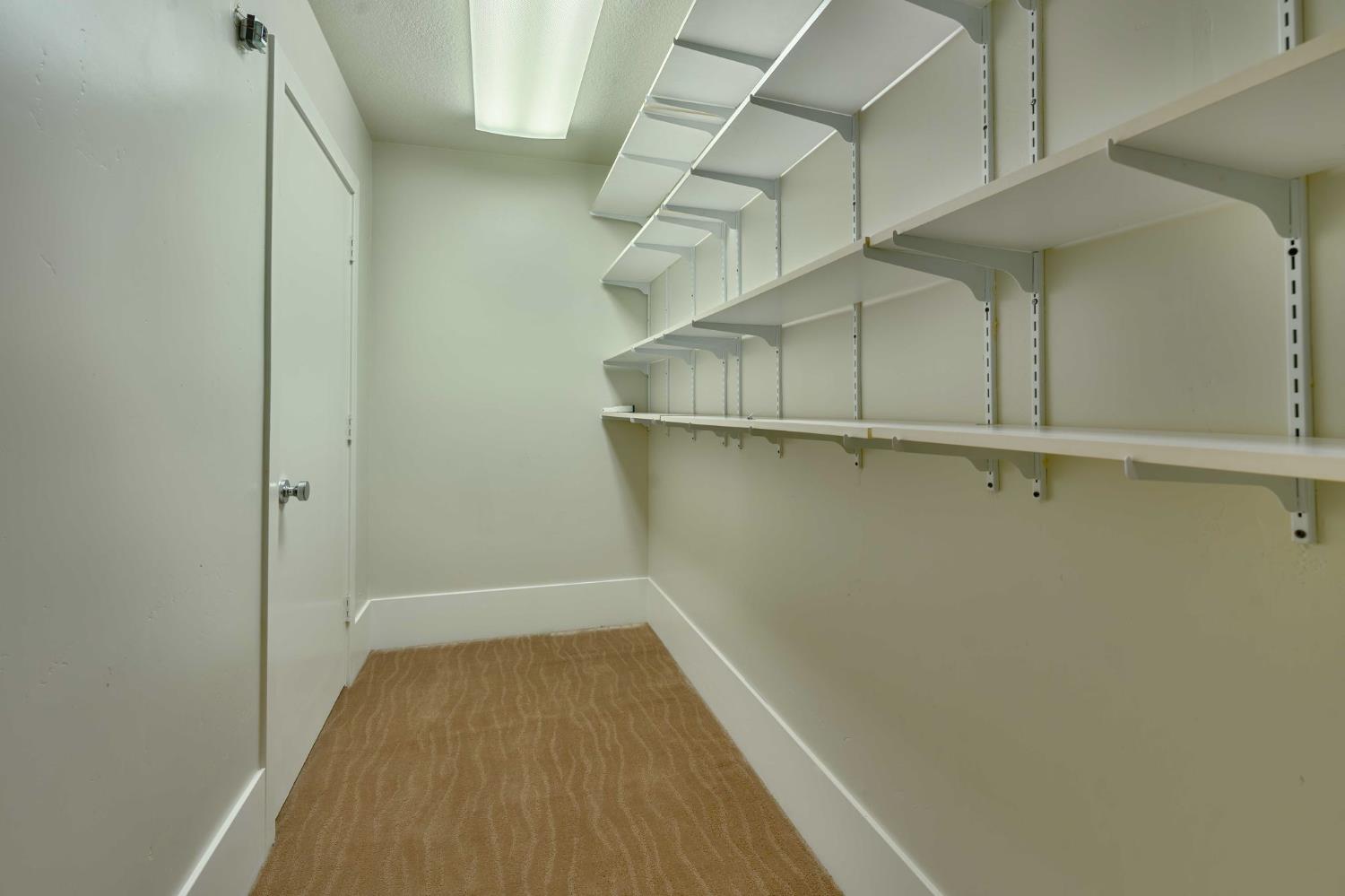 7529 Pineridge Road Fair Oaks, CA 95628 - Photo 35 of 62 a view of a room with racks on the wall