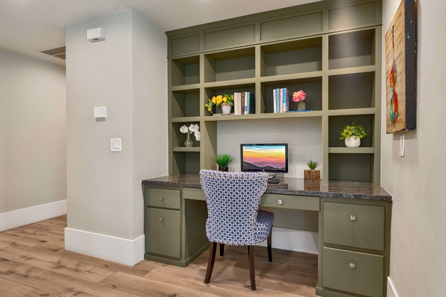 7529 Pineridge Road Fair Oaks, CA 95628 - Photo 37 of 62 a workspace with furniture and a book shelf