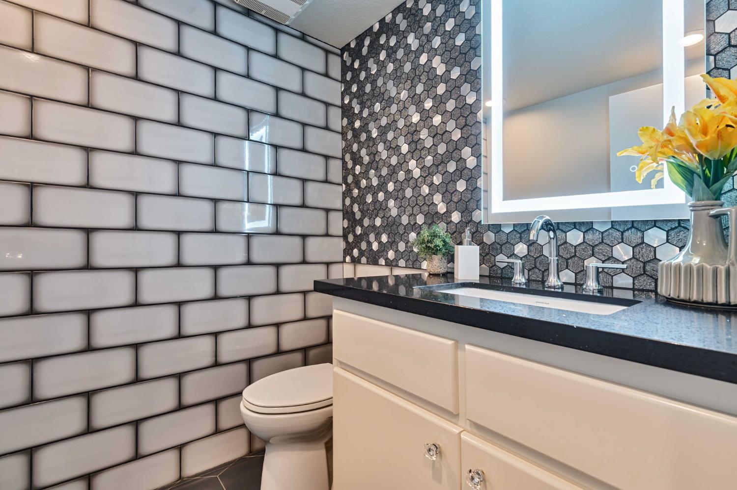 7529 Pineridge Road Fair Oaks, CA 95628 - Photo 40 of 62 a bathroom with a sink and a toilet