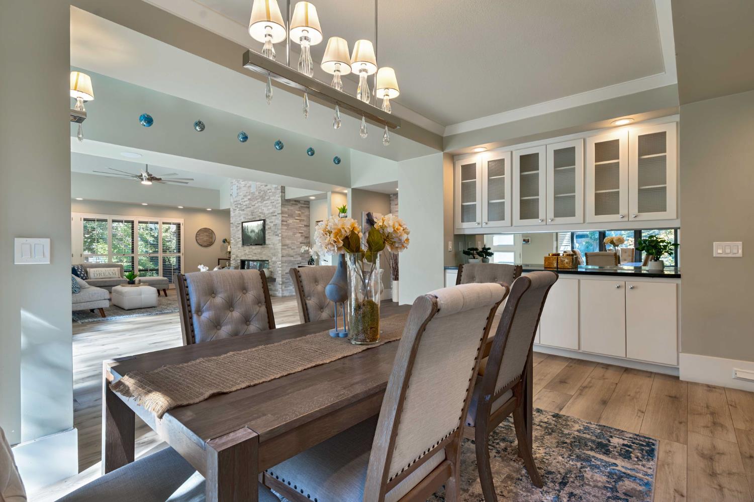 7529 Pineridge Road Fair Oaks, CA 95628 - Photo 10 of 62 a view of a dining room with furniture and chandelier
