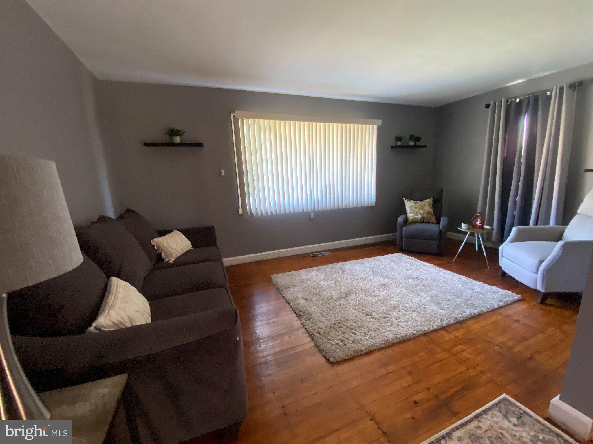 2181 Yerger Road Pottstown, PA 19464 - Photo 6 of 26 Cozy living space with warm tones.