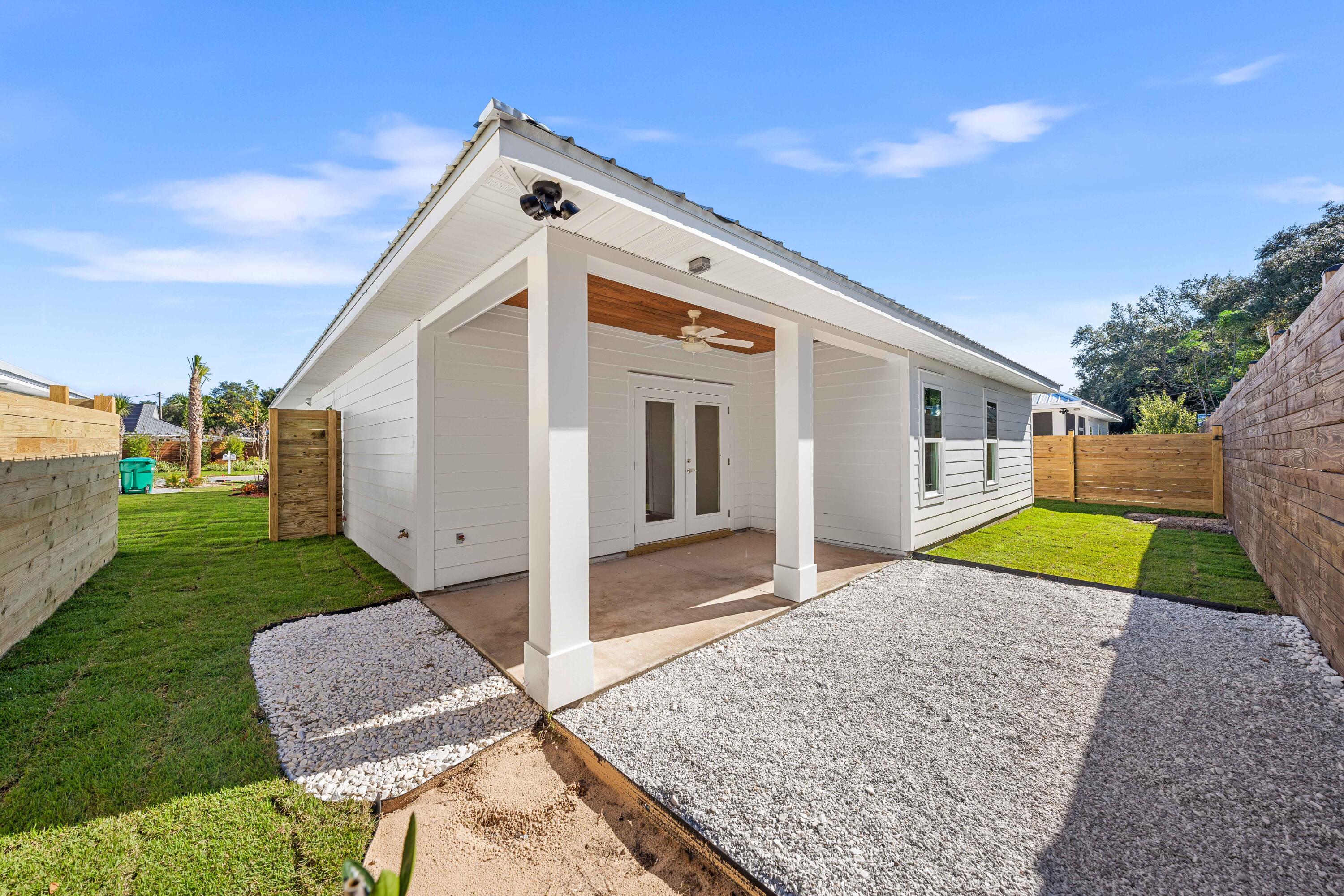 103 Fletcher Way Destin, FL 32541 - Photo 13 of 30 a view of a house with a yard