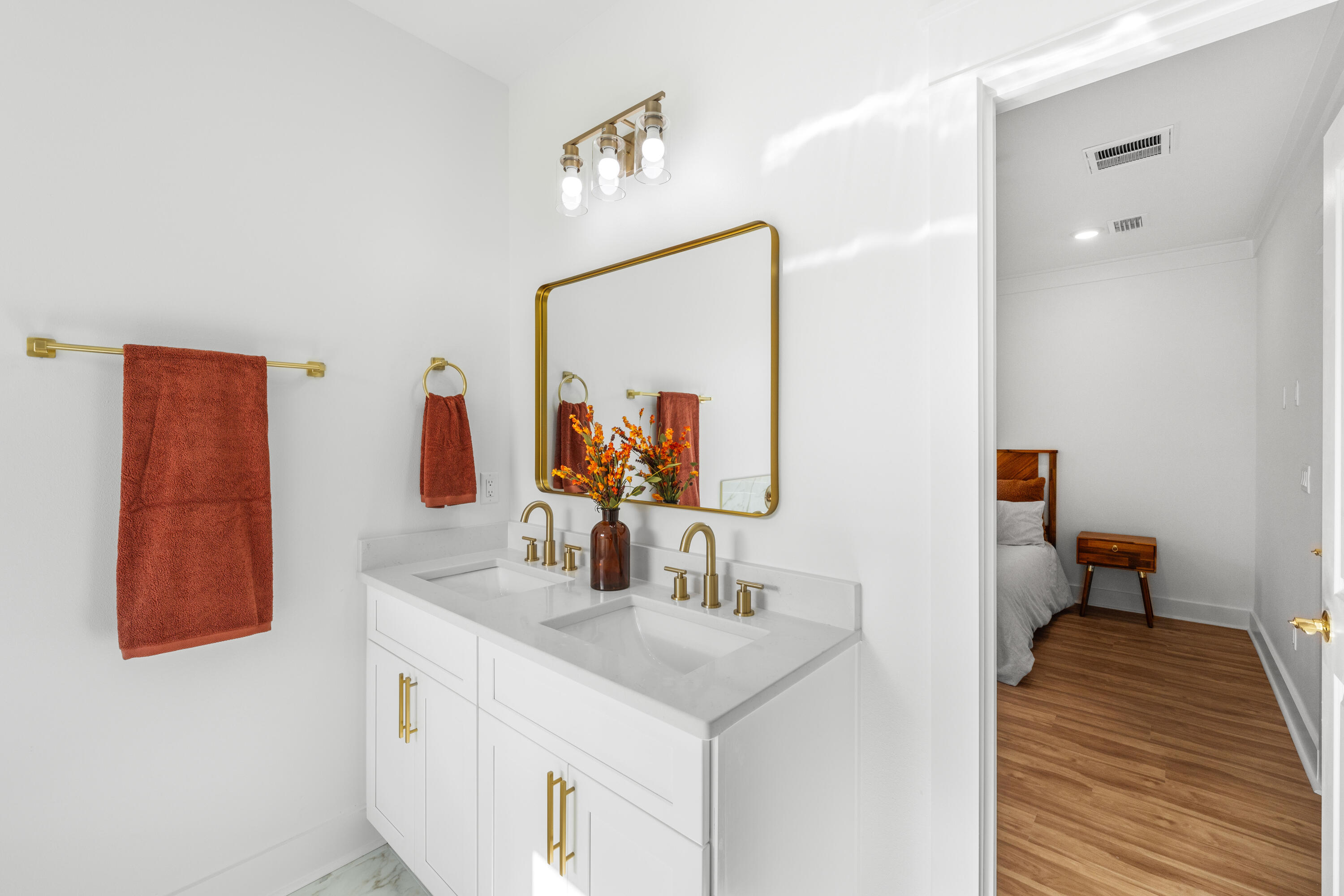 103 Fletcher Way Destin, FL 32541 - Photo 19 of 30 a bathroom with a sink and a mirror