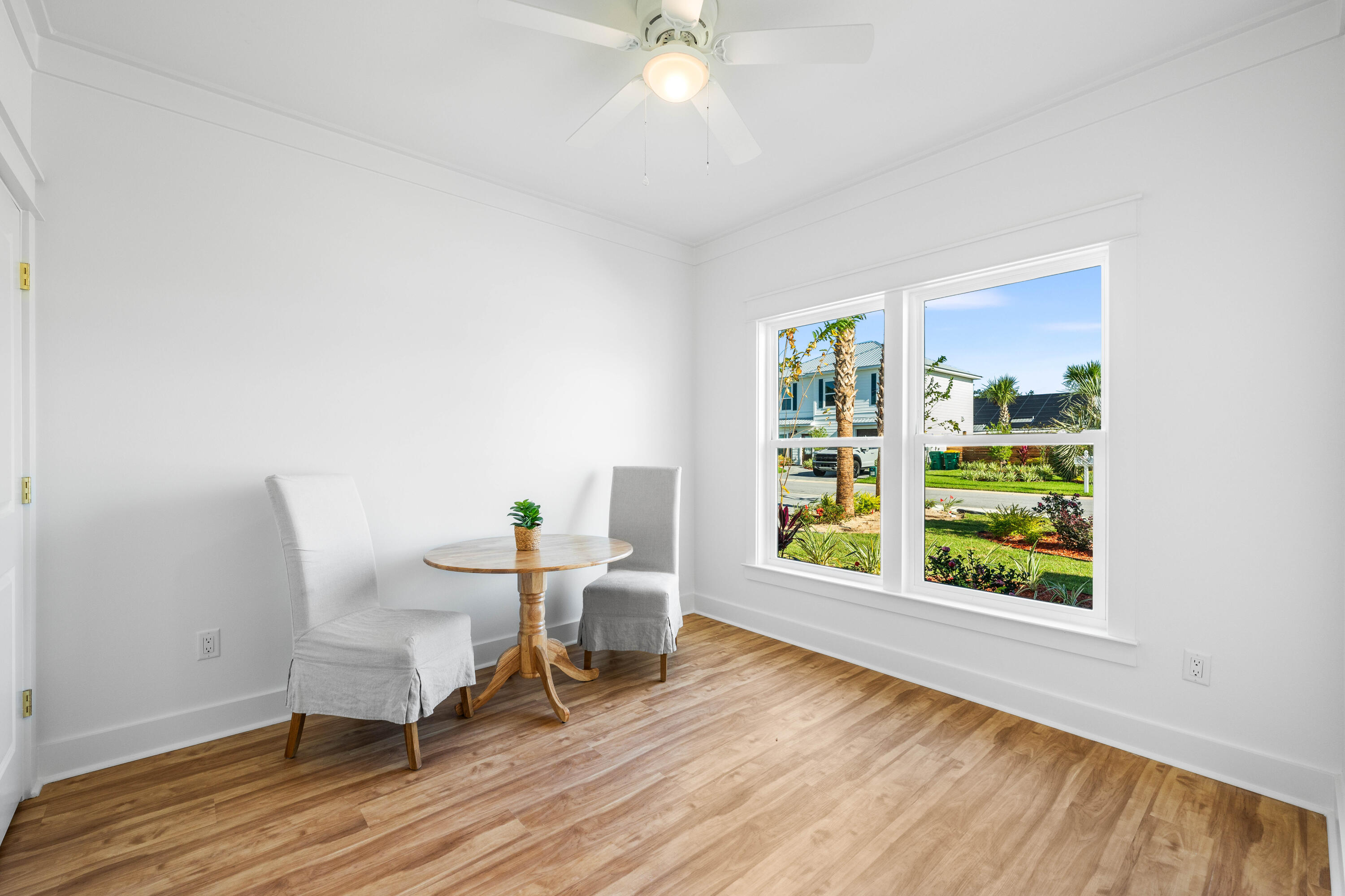 103 Fletcher Way Destin, FL 32541 - Photo 2 of 30 a view of a dining room with furniture and a window