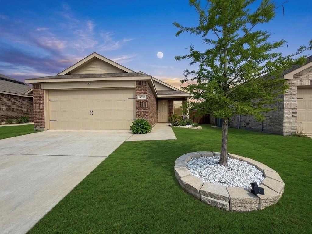 14033 Earlham Street Pilot Point, TX 76258 - Photo 22 of 32 ROCK LANDSCAPING