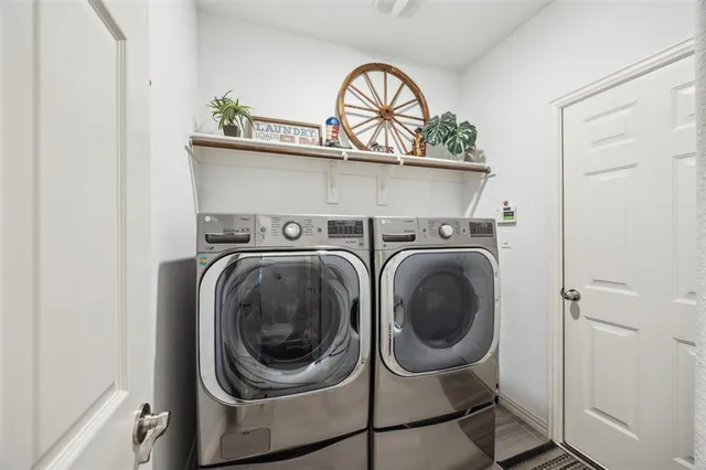 a utility room with dryer and washer