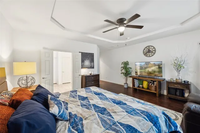 a living room with furniture a rug and a window