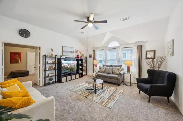 a room with gym equipment and a large window