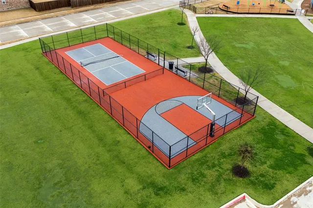 an aerial view of a house with swimming pool