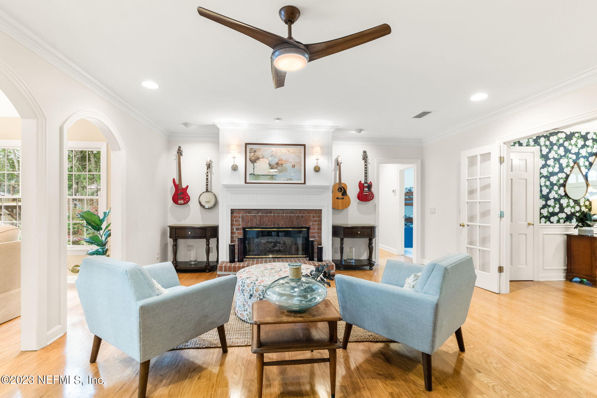 9465 Kells Road Jacksonville, FL 32257 - Photo 11 of 63 a living room with furniture and a fireplace