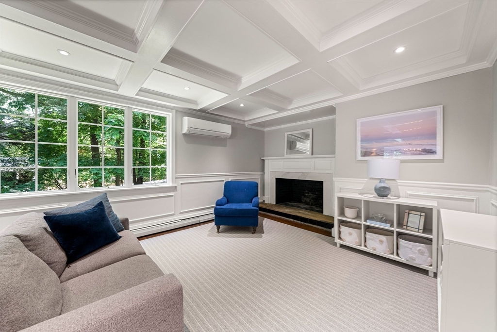 53 Windsor Road Wellesley, MA 02481 - Photo 11 of 42 a living room with furniture and a fireplace