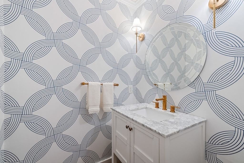 53 Windsor Road Wellesley, MA 02481 - Photo 16 of 42 a kitchen with a sink and a stove