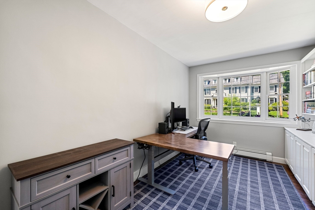 53 Windsor Road Wellesley, MA 02481 - Photo 19 of 42 a workspace with wooden floor and a window