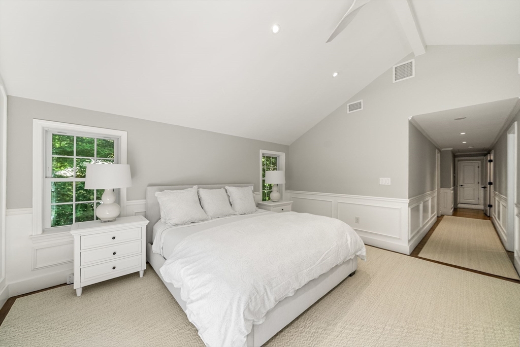 53 Windsor Road Wellesley, MA 02481 - Photo 20 of 42 a bedroom with a large bed and a window