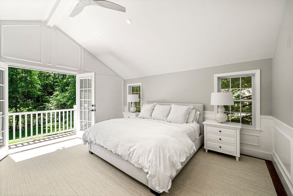 53 Windsor Road Wellesley, MA 02481 - Photo 21 of 42 a bed room with a bed and a chair