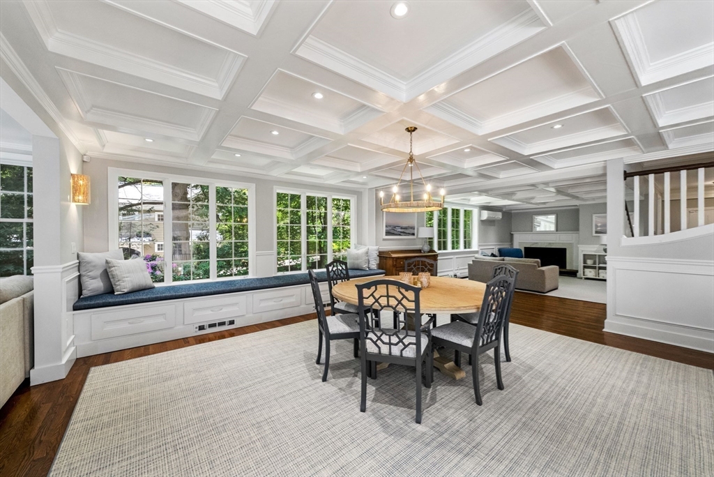 53 Windsor Road Wellesley, MA 02481 - Photo 7 of 42 a dining room with furniture a chandelier and wooden floor