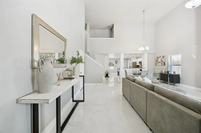 a living room with furniture and a table
