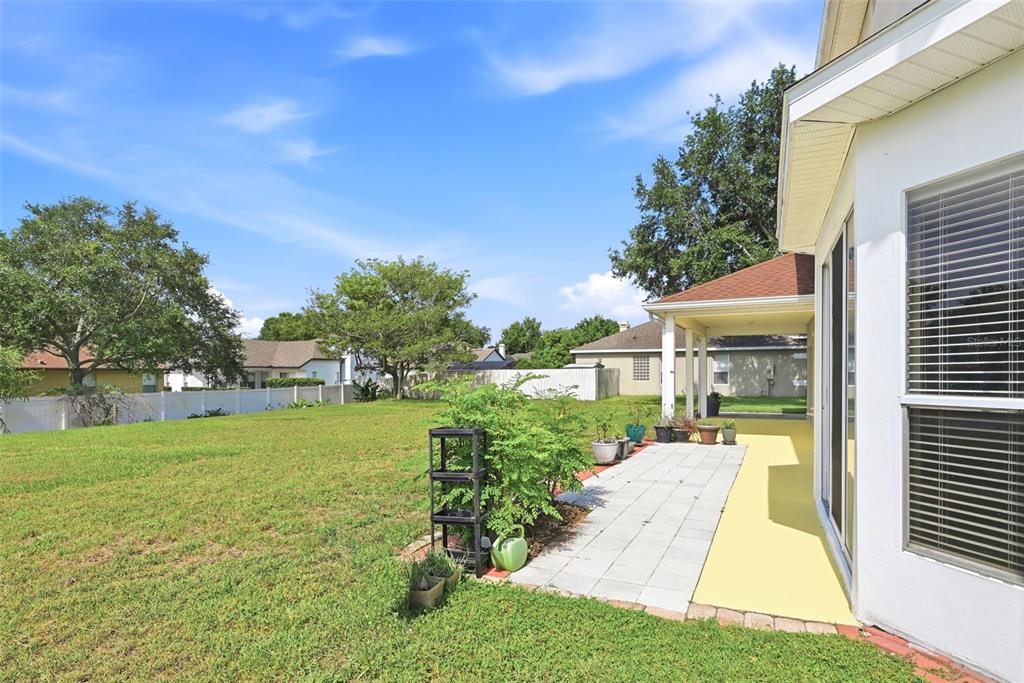 936 Kingsridge Circle Gotha, FL 34734 - Photo 27 of 50 a view of a porch with a yard