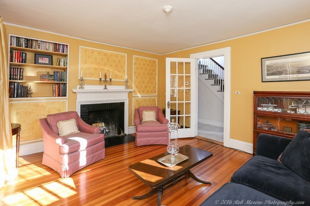 9 Woodside Road Topsfield, MA 01983 - Photo 8 of 27 a living room with furniture and a fireplace