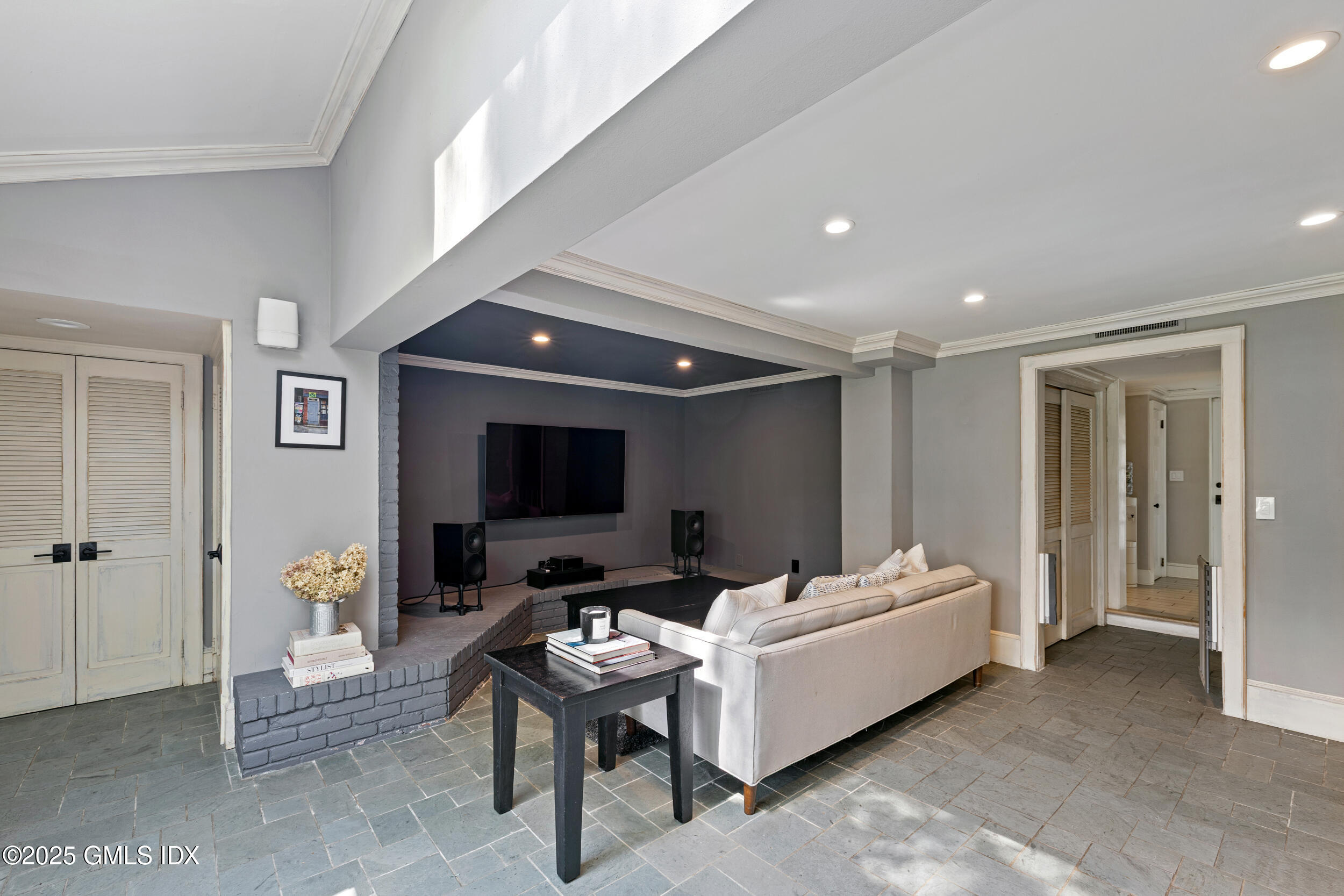 467 Laurel Road New Canaan, CT 06840 - Photo 14 of 50 a living room with furniture and a flat screen tv