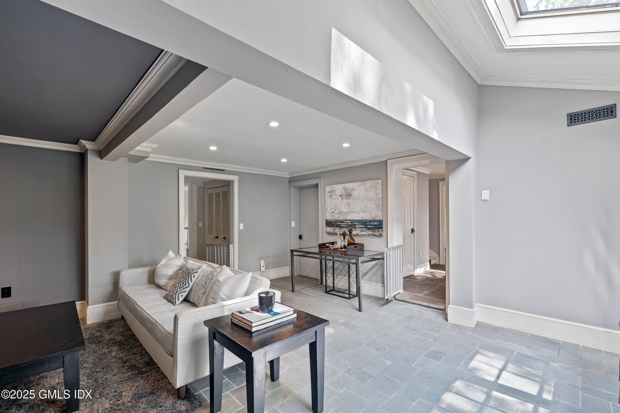 467 Laurel Road New Canaan, CT 06840 - Photo 15 of 50 a living room with furniture and a table