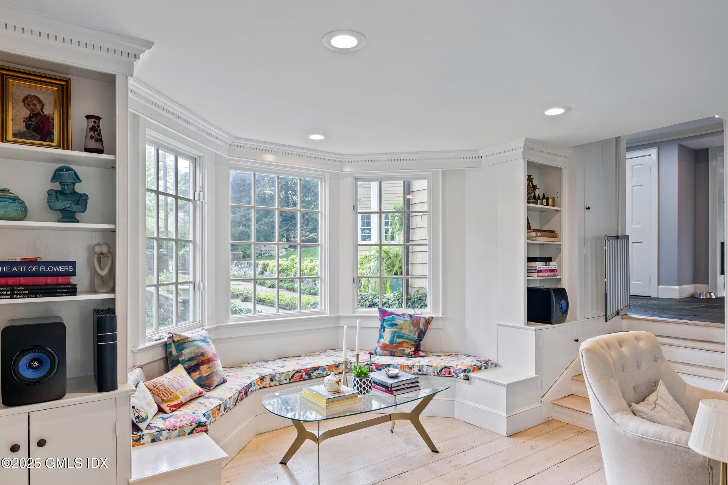 467 Laurel Road New Canaan, CT 06840 - Photo 30 of 50 a living room with furniture and a fireplace