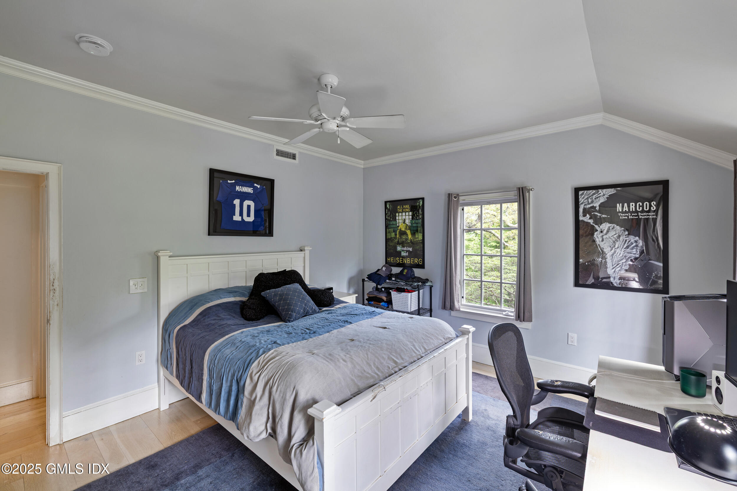 467 Laurel Road New Canaan, CT 06840 - Photo 37 of 50 a bedroom with a bed two couch and a window