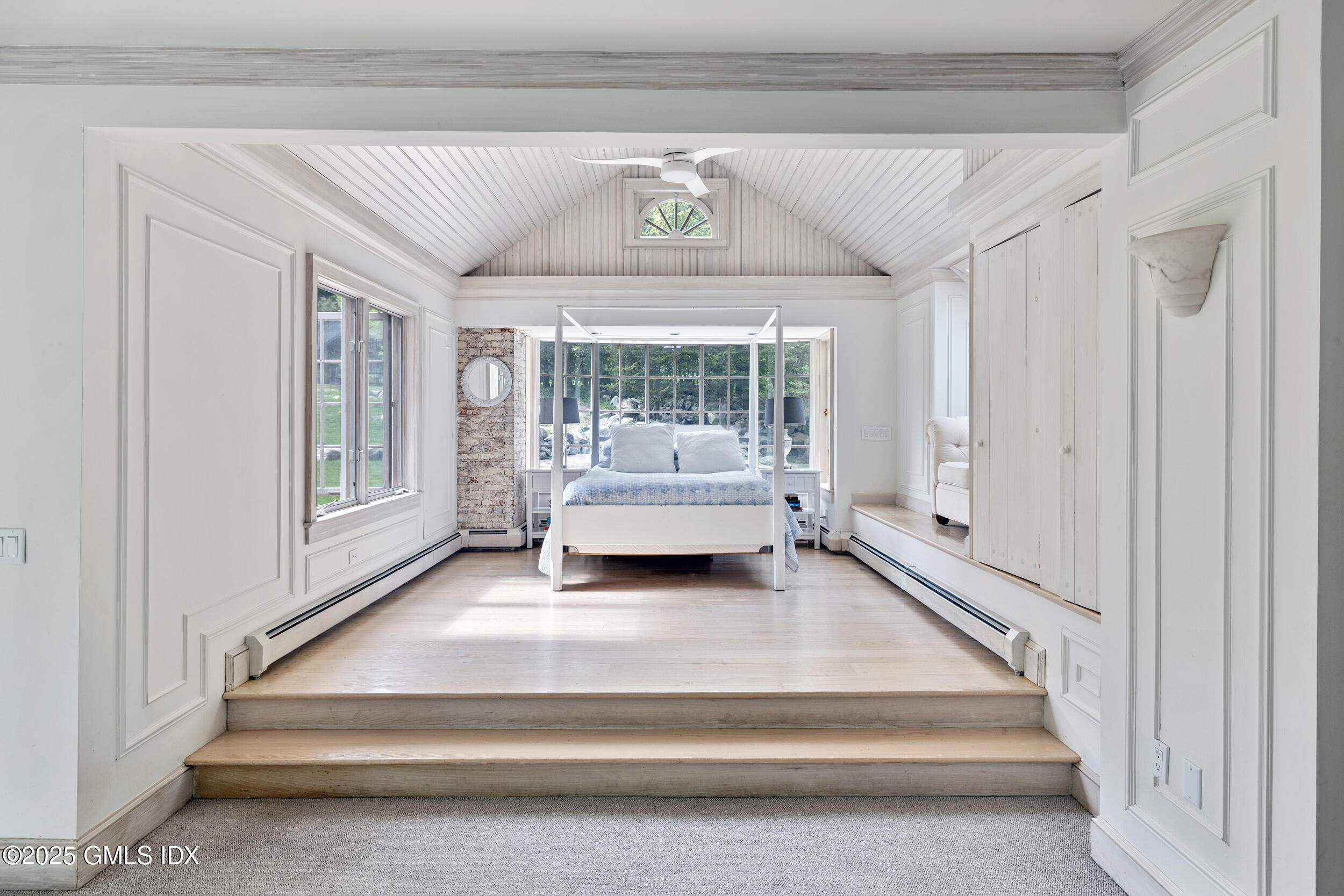 467 Laurel Road New Canaan, CT 06840 - Photo 38 of 50 a bedroom with a bed and a large window