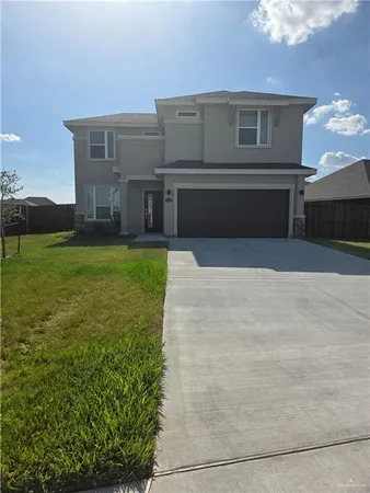 a front view of house with yard