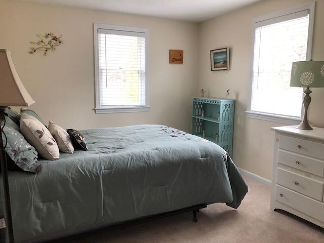 6 Pine Ridge Road Truro, MA 02666 - Photo 16 of 30 a bedroom with a bed and a window