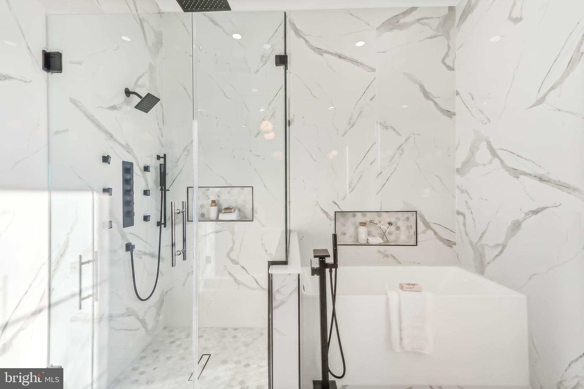 4920 Loughboro Road Northwest Washington, DC 20016 - Photo 14 of 41 a bathroom with a shower