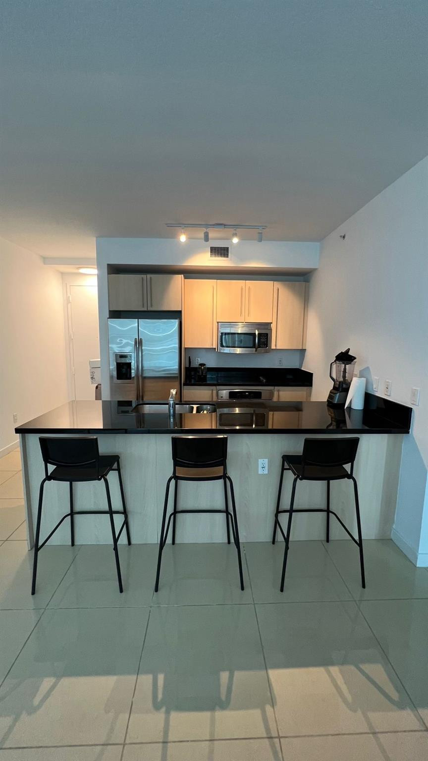 79 Southwest 12th Street, Unit 2908S Miami, FL 33130 - Photo 21 of 29 a view of a workspace with furniture