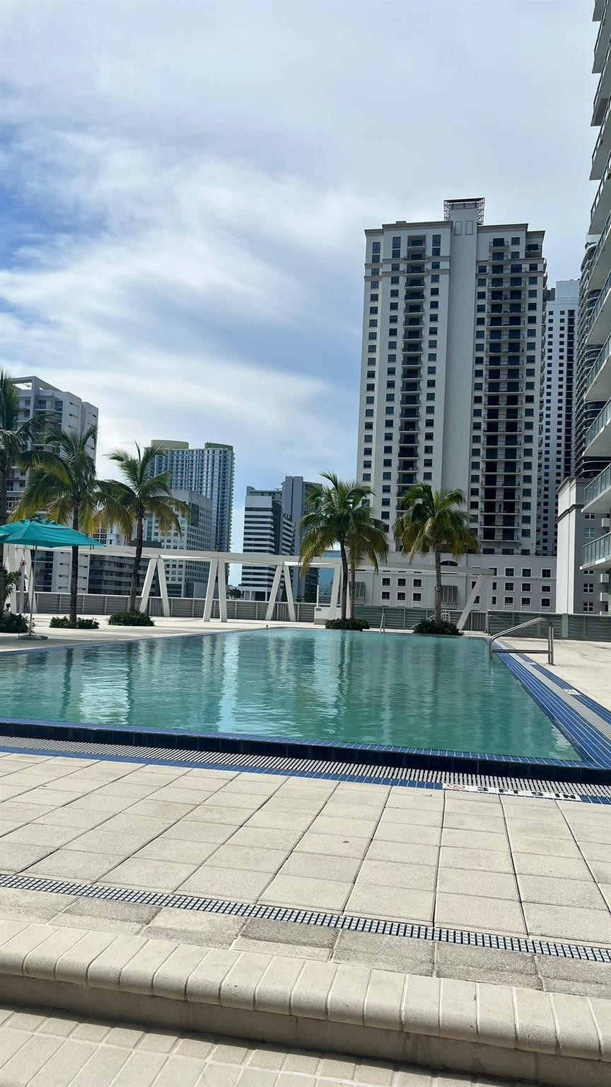 79 Southwest 12th Street, Unit 2908S Miami, FL 33130 - Photo 4 of 29 a view of swimming pool with a yard