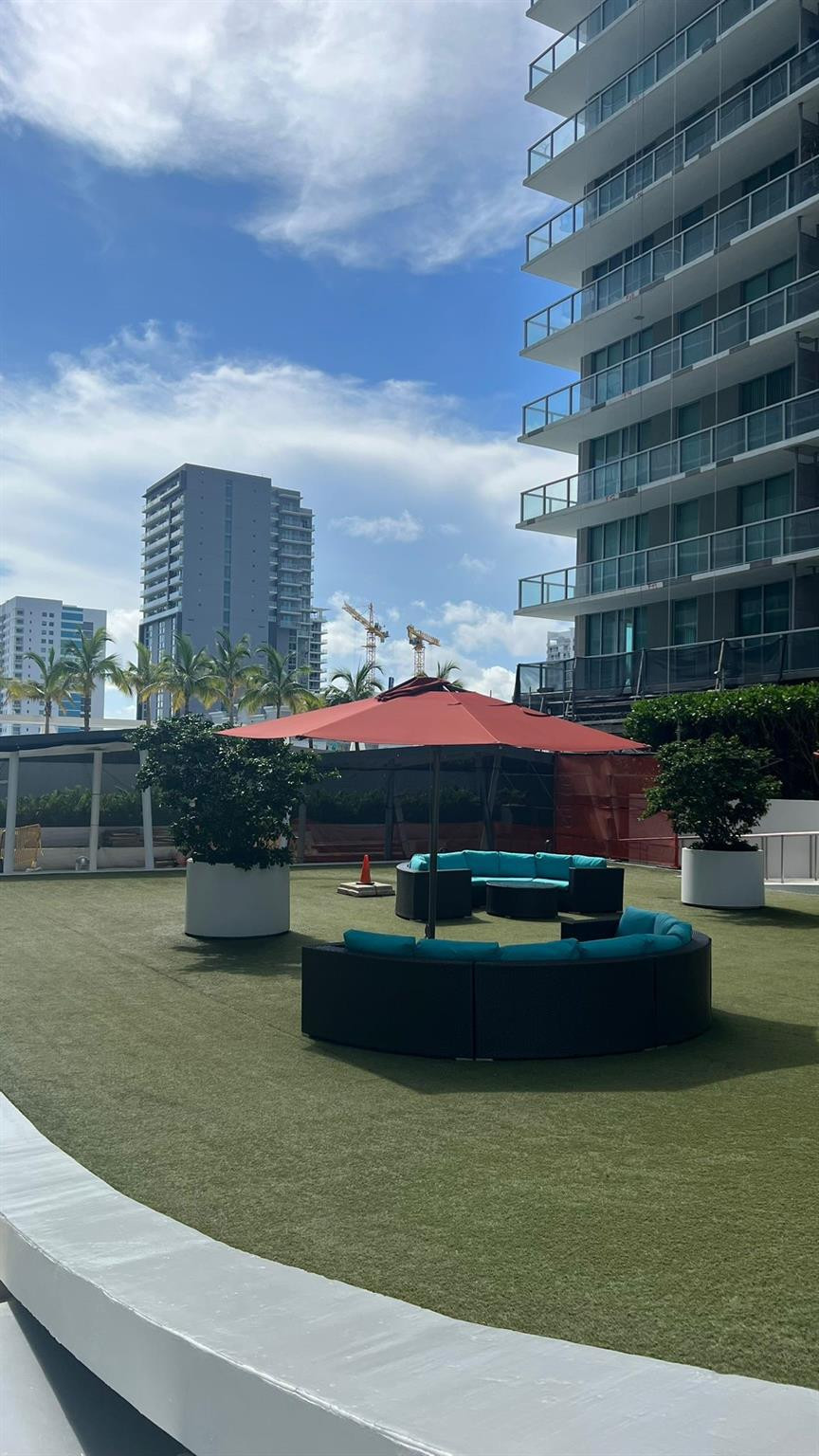 79 Southwest 12th Street, Unit 2908S Miami, FL 33130 - Photo 8 of 29 a small pool is sitting in the middle of a lake