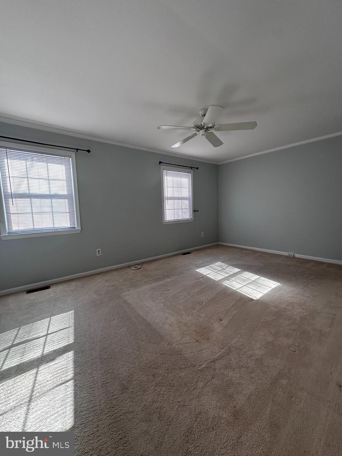 5832 1st Landing Way, Unit 137 Burke, VA 22015 - Photo 15 of 30 a view of empty room with window and ceiling fan