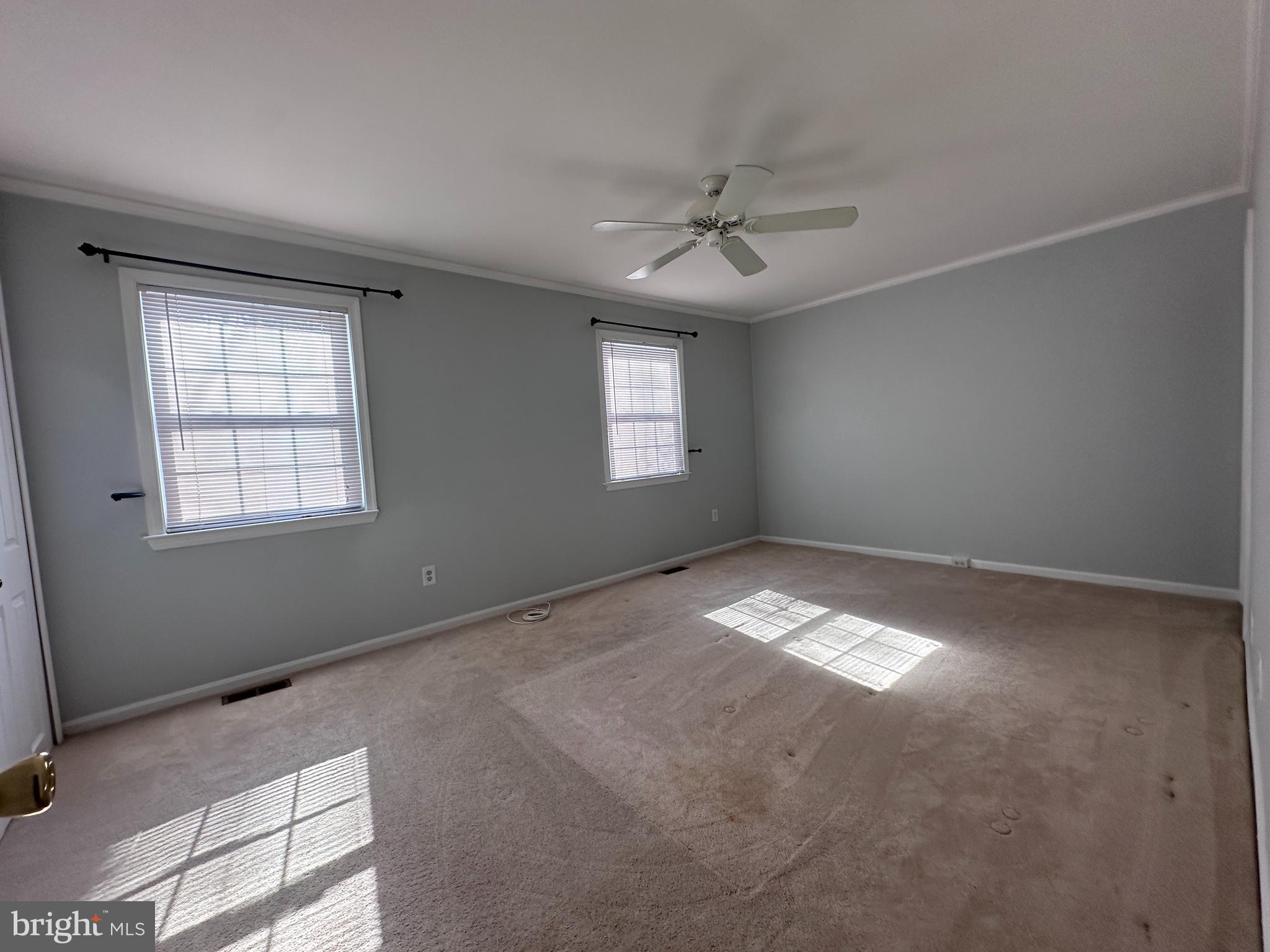 5832 1st Landing Way, Unit 137 Burke, VA 22015 - Photo 19 of 30 a view of empty room with windows