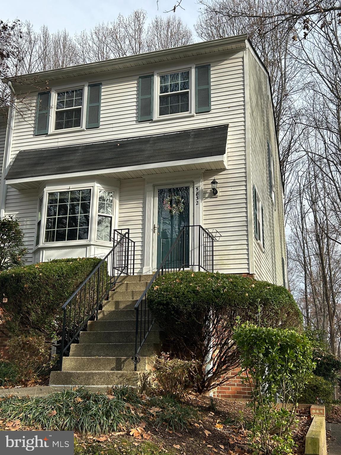 5832 1st Landing Way, Unit 137 Burke, VA 22015 - Photo 2 of 30 a view of a house with a yard
