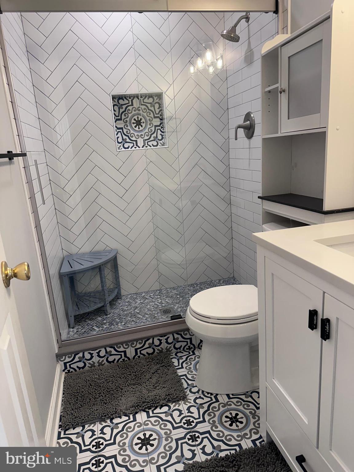 5832 1st Landing Way, Unit 137 Burke, VA 22015 - Photo 23 of 30 a bathroom with a toilet and a shower