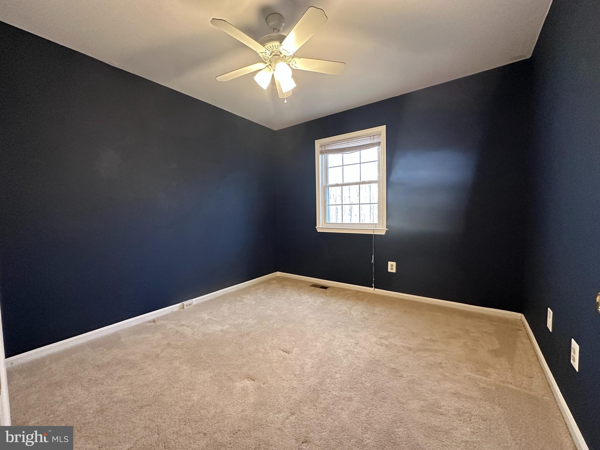5832 1st Landing Way, Unit 137 Burke, VA 22015 - Photo 25 of 30 a view of an empty room with a window