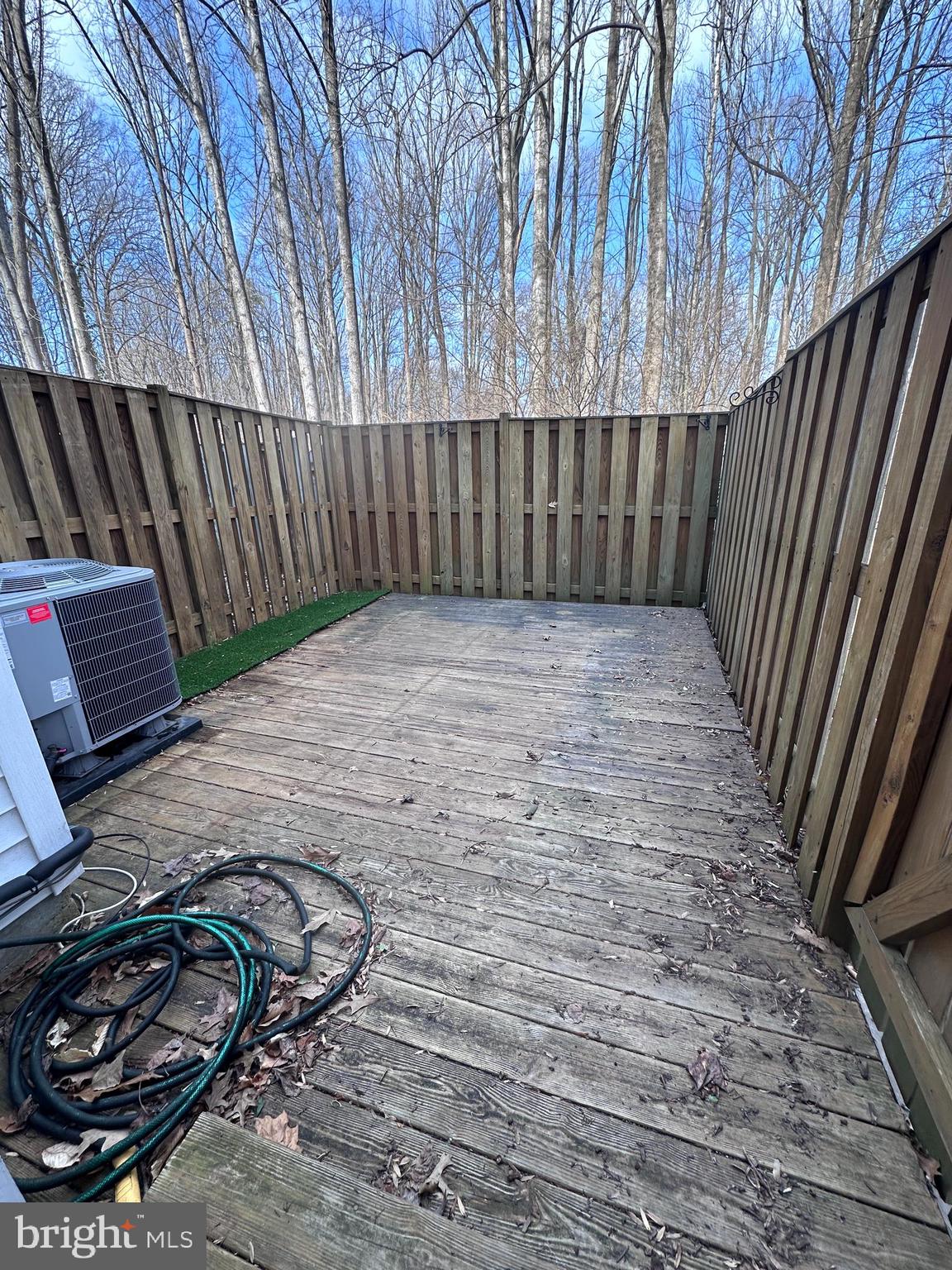 5832 1st Landing Way, Unit 137 Burke, VA 22015 - Photo 29 of 30 a view of a backyard with wooden fence