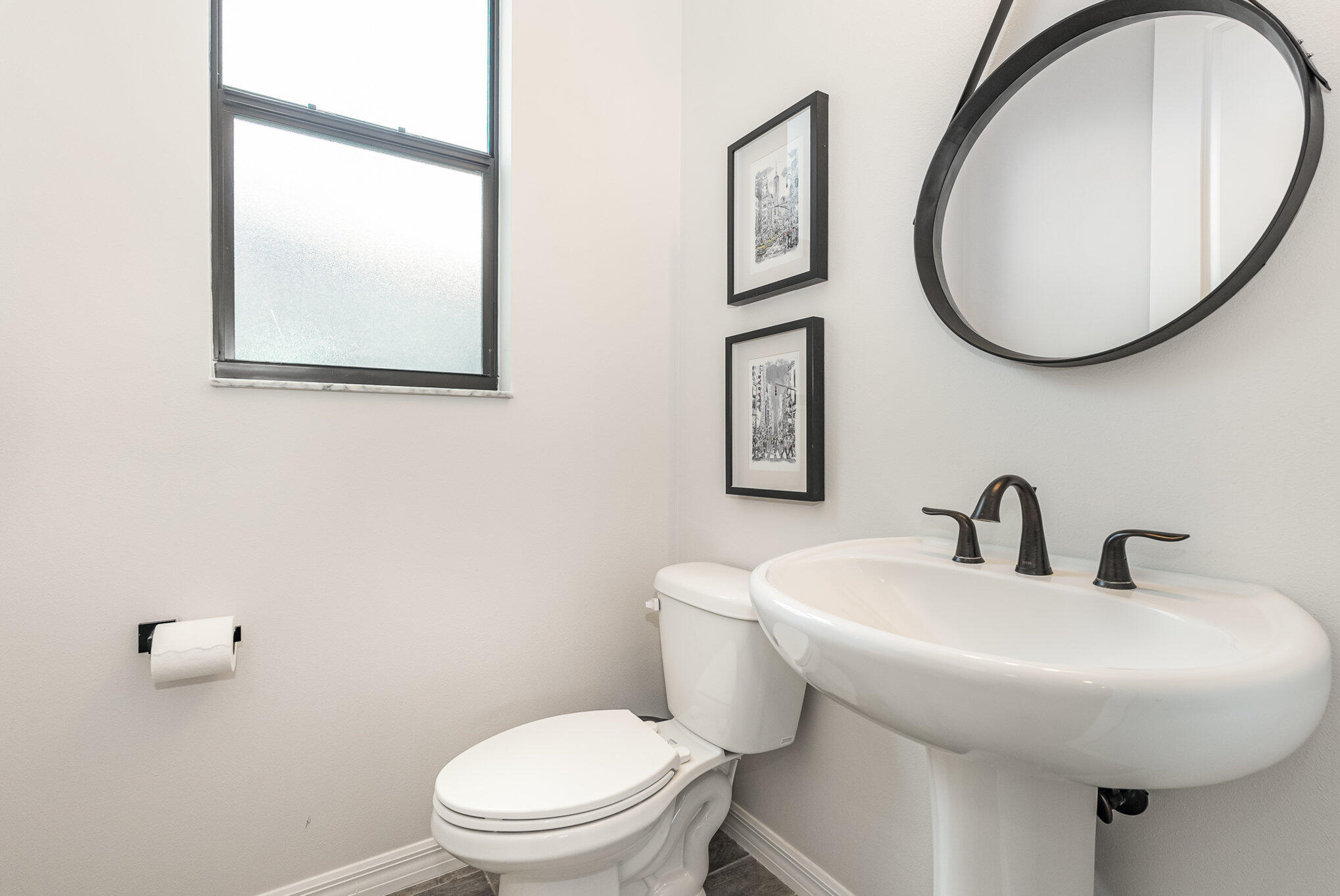 3179 Ribbon Grass Drive Melbourne, FL 32940 - Photo 16 of 52 a bathroom with a toilet a sink and mirror