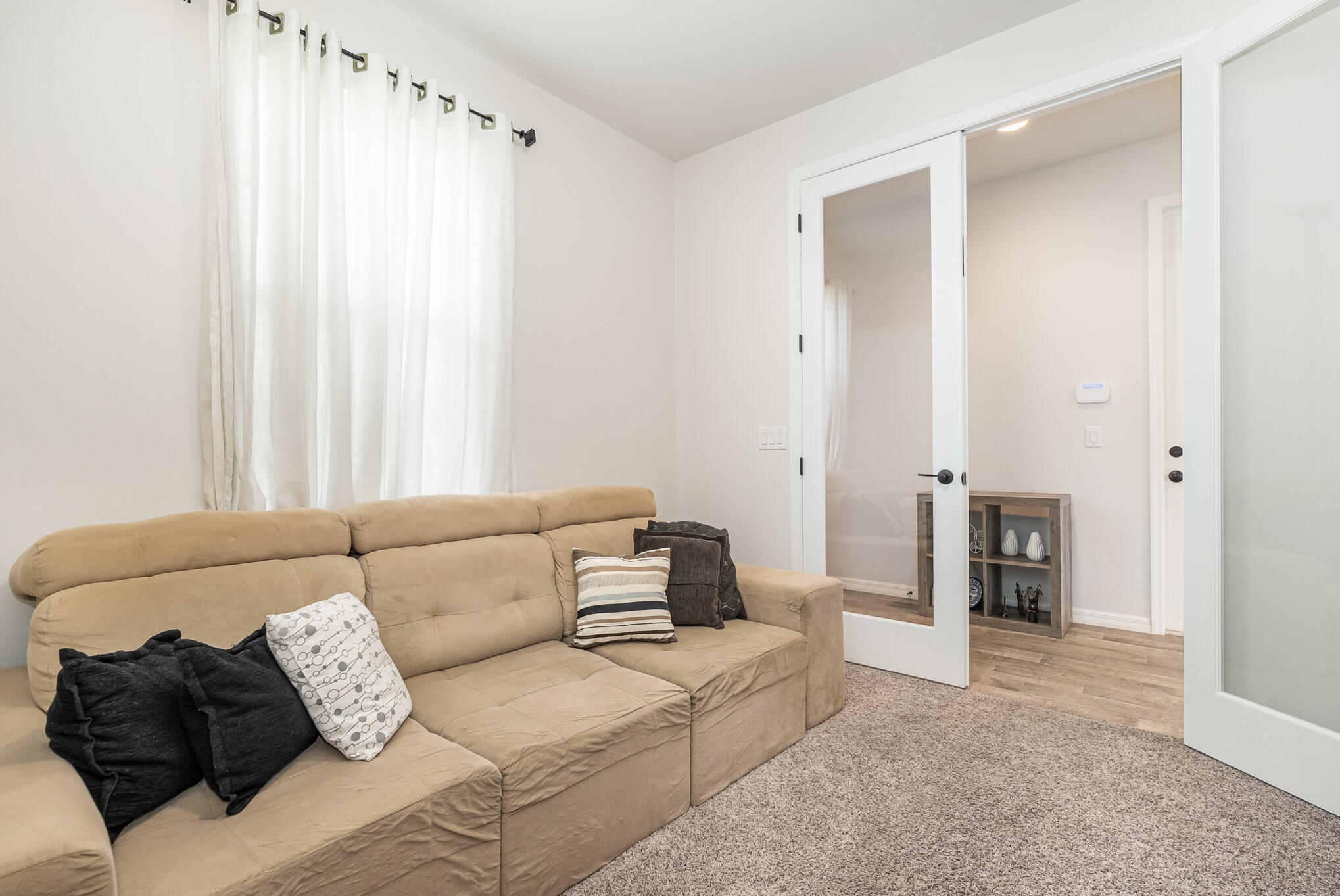 3179 Ribbon Grass Drive Melbourne, FL 32940 - Photo 18 of 52 a living room with furniture and a couch