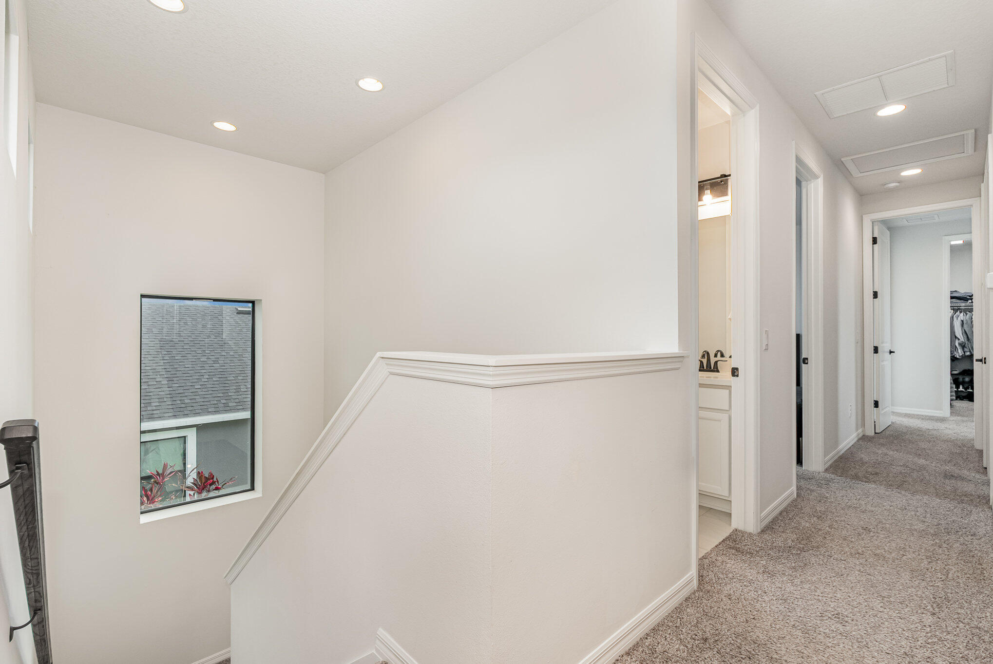3179 Ribbon Grass Drive Melbourne, FL 32940 - Photo 19 of 52 a view of a hallway with closet