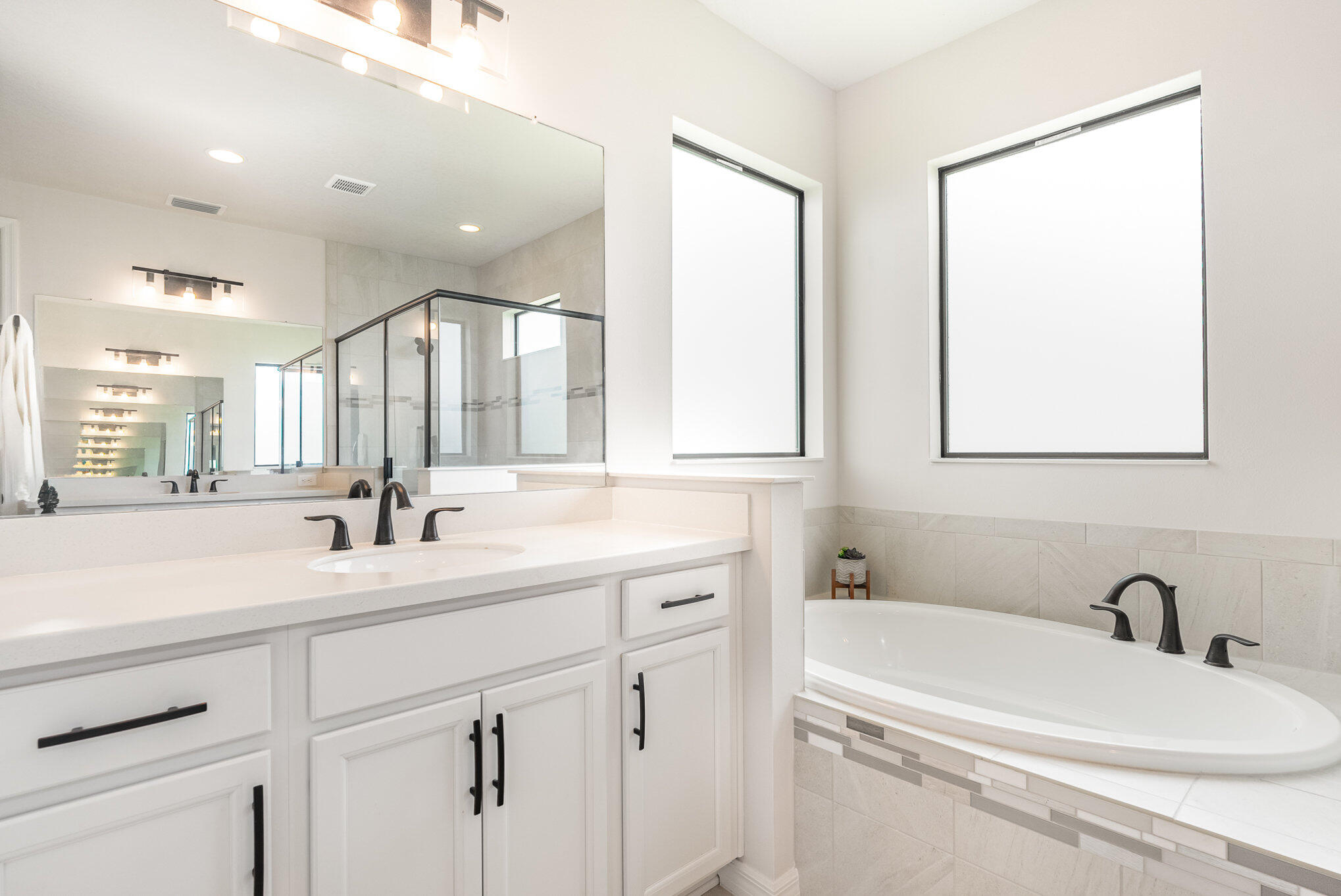 3179 Ribbon Grass Drive Melbourne, FL 32940 - Photo 26 of 52 a bathroom with a sink and a bathtub